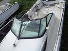 Used 1988 Larson DC228 22' Cuddy Cabin Complete Glass Windshield Assy. Price: $1450.00.