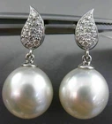 Estate .22CT Diamond & South Sea Pearl 18K White Gold Pave Leaf Hanging Earrings Pre-owned. Price: $3420.41.