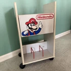 Vintage Nintendo Super Mario Brothers Rolling Console Storage Cart 1989 Nes !!!! Used. Price: $325.00.