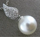 Estate .18CT Diamond & South Sea Pearl 18K White Gold Pave Leaf Floating Pendant Pre-owned. Price: $4595.13.