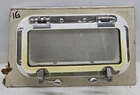 # PW512 New Found Metals Tri-matrix Rectangular Self Sealing Portlight 5" 12" Used. Price: $125.00.